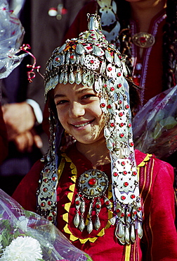 Girl wearing national costume in town of Mary in Turkmenistan