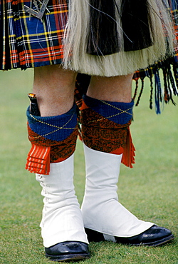 Traditional Scottish kilt and sporran with dirk dagger in sock at the Braemar Royal Highland Gathering, the Braemar Games in Scotland