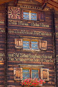 Traditional inscription on 18th century Swiss house built 1741 in Serneus near Klosters, Graubunden region, Switzerland, Europe