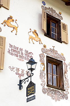 Pension Val Tuoi in the Engadine Valley in village of Guarda with old painted stone 17th century houses, Graubunden, Switzerland, Europe