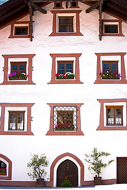 Window detail of traditional old 18th century Tyrolean house in the town of Oetz in the Tyrol, Austria, Europe