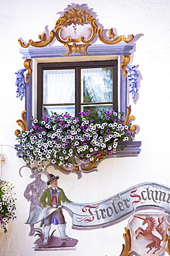 Traditional painted walls above jewellery and gift shop Tiroler Schmudkaftl in the town of Seefeld in the Tyrol, Austria, Euope