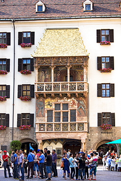 Tourists at Goldenes Dachl (Golden Roof), built in 1500 of gilded copper in Herzog Friedrich Strasse, Innsbruck, the Tyrol, Austria, Europe