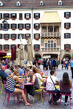 Tourists at Goldenes Dachl (Golden Roof), built in 1500 of gilded copper in Herzog Friedrich Strasse, Innsbruck, the Tyrol, Austria, Europe