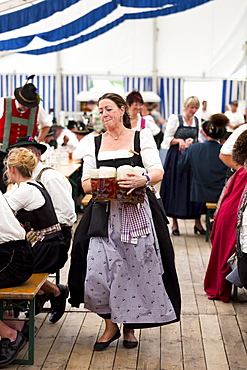 Woman in costume as serving wench at beer festival in the village of Klais in Bavaria, Germany, Europe