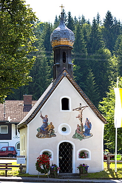 Church of St. Peter and Paul with traditional onion dome in the village of Klais in Bavaria, Germany, Europe