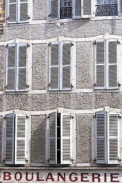 Window shutters above traditional Boulangerie bread shop in Pau, Pyrenees, France, Europe