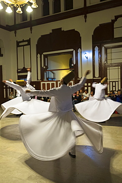 Whirling Dervish dance performance (Mevlevi Sema), a spiritual ceremony performed by whirling dervishes, Istanbul, Turkey, Eurasia