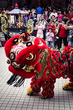 A traditional lion dance during Chinese New Year celebrations, Thean Hou Temple, Kuala Lumpur, Malaysia, Southeast Asia, Asia