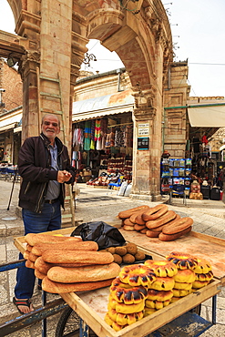 Bread seller with cart, Aftimos Souk, Mauristan, Christian Quarter, Old City, Jerusalem, UNESCO World Heritage Site, Israel, Middle East