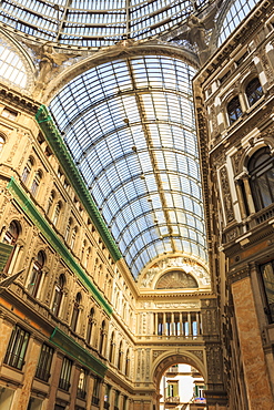 Morning light illuminates the Galleria Umberto I arcade, 1890, through its spectacular glass vaulted roof, City of Naples, Campania, Italy, Europe