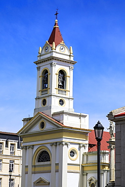 Cathedral on a sunny day, blue sky, Plaza Munoz Gamero (Plaza de Armas), Punta Arenas, Magallanes, Chile, South America