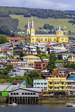 Castro, from the sea, Iglesia San Francisco de Castro, UNESCO World Heritage Site, and palafitos, Isla Grande de Chiloe, Chile, South America