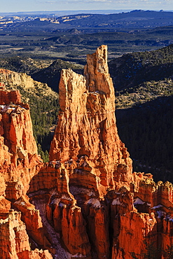 Hoodoos lit by late afternoon sun with distant view in winter, Paria View, Bryce Canyon National Park, Utah, United States of America, North America