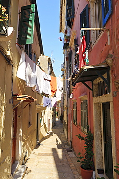 Narrow street and washing, Old Town, Corfu Town, UNESCO World Heritage Site, Corfu, Ionian Islands, Greek Islands, Greece, Europe