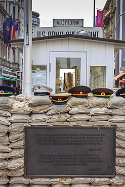 Commemorative plaque, guardhouse, sandbags and uniform caps, Checkpoint Charlie, Mitte, Berlin, Germany, Europe