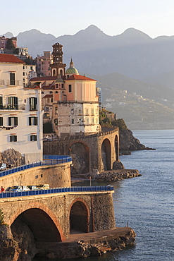 Church of Santa Maria Maddalena and coast road with mountains, warm early morning light, Atrani, near Amalfi, Costiera Amalfitana (Amalfi Coast), UNESCO World Heritage Site, Campania, Italy, Europe