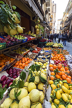 Fruit, including local lemons and oranges, displayed outside a shop in a narrow street, Sorrento, Campania, Italy, Europe