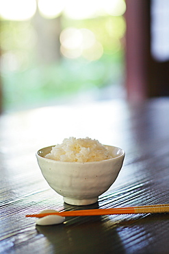 Bowl Of Rice And Chopsticks