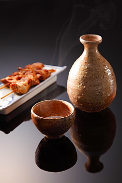 Traditional Japanese Sake Cup and Jug