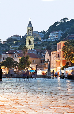 People at Hvar old town at twilight in Croatia