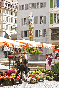 Market place with justice fountain at Place de la Palud, Lausanne, Switzerland