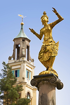 Statue of Burmese dancer in Portmeirion village, Gwynedd, Wales, UK