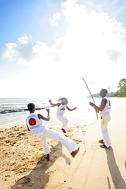 Local people playing capoeira on the beach, Boipeba Island, Tinhare, Brazil, South America