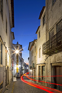 View along the medieval cobbled street of Rua dos Mercadores historic centre of Evora, UNESCO World Heritage Site, Alentejo, Portugal, Europe