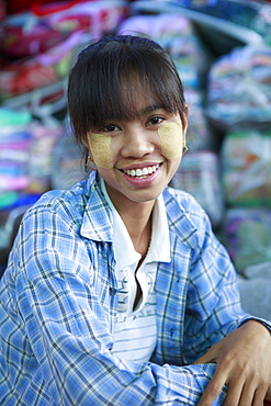 Monywa girl with traditional Burmese thanaka face paint, Monywa, Sagaing, Myanmar, Southeast Asia