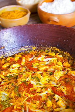 Seafood moqueca, a traditional Bahian dish, served with vatapa, rice and manioc farofa, Bahia, Brazil, South America