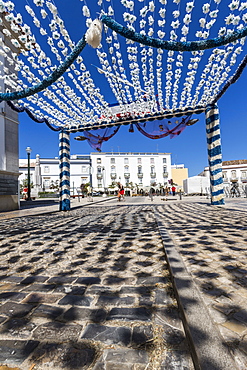 Colors and decoration in the pedestrian centre of Tavira on a sunny summer day, Faro, Algarve, Portugal, Europe