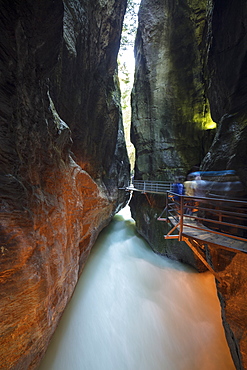 Water of creek flows in the narrow limestone gorge carved by river, Aare Gorge, Bernese Oberland, Canton of Berne, Switzerland, Europe