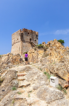 Genoese tower of granite rocks built as fortress of defense framed by blue sky, Porto, Southern Corsica, France, Mediterranean, Europe