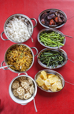 Bhutanese dishes served at a restaurant in Thimphu rice and vegetables including chilli, Bhutan, Asia