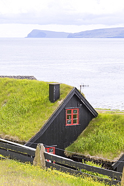 Traditional houses with grass (turf) roof, Kirkjubour, Streymoy island, Faroe Islands, Denmark, Europe