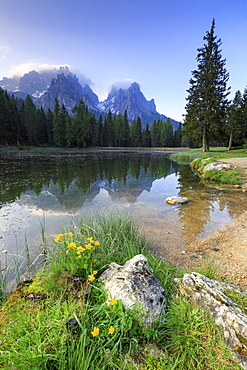 Cadini di Misurina group reflected in Lake Antorno at sunrise, Auronzo of Cadore, Veneto Sesto Dolomites, Italy, Europe