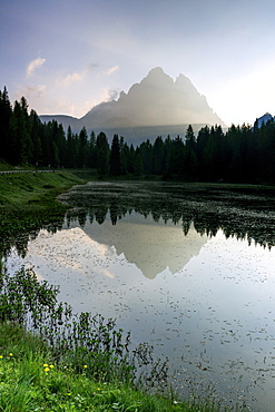 The Three Peaks of Lavaredo are reflected in Lake Antorno at sunrise, Veneto Sesto Dolomites, Italy, Europe