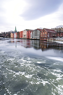 Colorful houses reflected in the River Nidelva, Bakklandet, Trondheim, Norway, Scandinavia, Europe