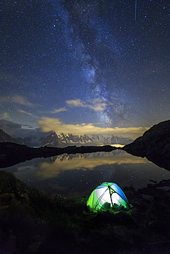 Camping under the stars and Milky Way on the shores of Lac de Cheserys, Chamonix, Haute Savoie, French Alps, France, Europe