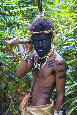 Traditional dressed man holding a spear, Ekasup Cultural Village, Efate, Vanuatu, Pacific