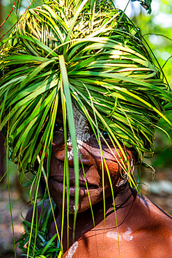 Traditional masked man, Yaka tribe, Mbandane, Democratic Republic of the Congo, Africa