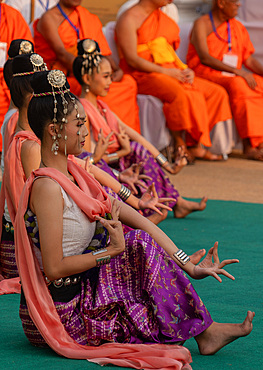 Thai classical dancers and musicians at Makha Bucha Buddhist celebrations where relics of Buddha are enshrined at the Royal Park Rajapruek, Chiang Mai, Thailand, Southeast Asia, Asia