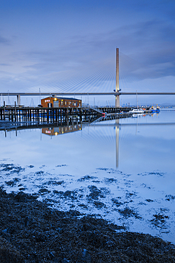 The Queensferry Crossing at dusk, view from the Fírth of Forth at South Queensferry, near Edinburgh, Scotland, United Kingdom, Europe