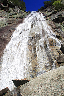 Swiss alps, mountain waterfall in springtime, bernese , bern, switzreland