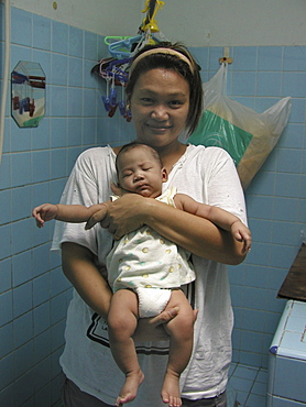 Thailand kathy, a philippino singer and her baby, phuket