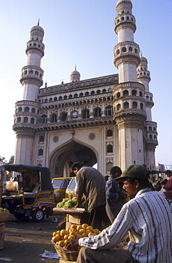 India - fruit sellers in front of the charminar monument, hyderabad