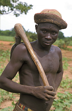 Ghana farmer holding a hoe for digging bongo, bolgatanga (north ghana)