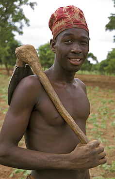 Ghana farmer holding a hoe for digging bongo, bolgatanga (north ghana)