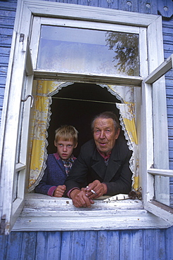 Russia man and boy at window vazhini, st. Petersburg district